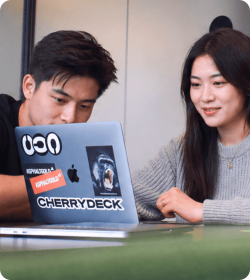 Colleagues working together on a digital product